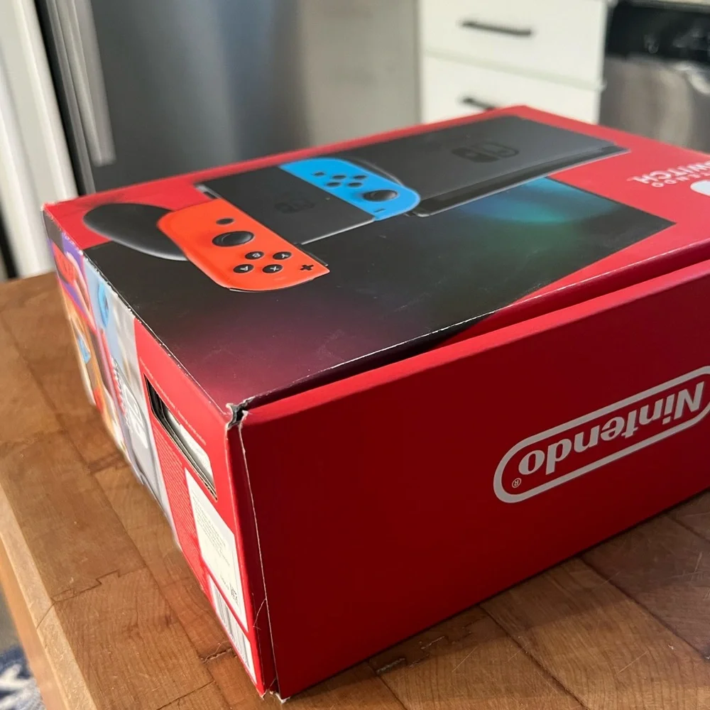 Nintendo Switch Console with Blue and Red Joy-Con